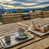 Coffee and cake with view to Schneeberg Viennese Alps
